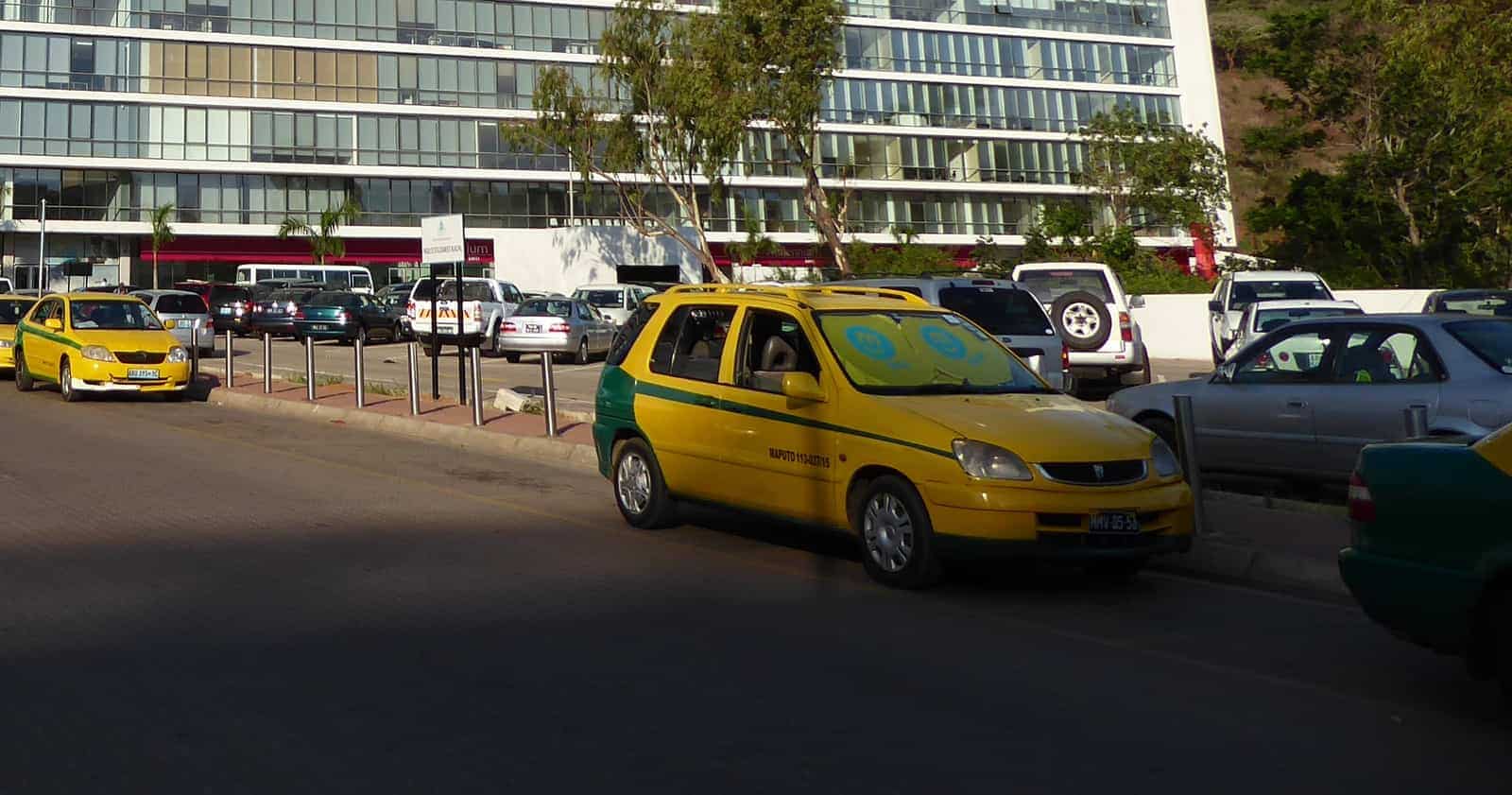 Yellow taxis at a taxi rank in Maputo